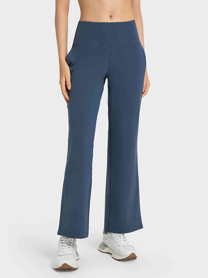 Pantalon de sport fendu à jambe large avec poches