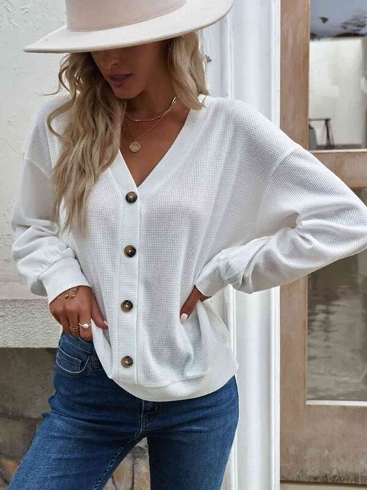 Blouse à épaules tombantes et col en V