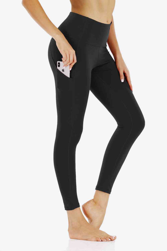 Leggings deportivos de cintura ancha con bolsillos laterales