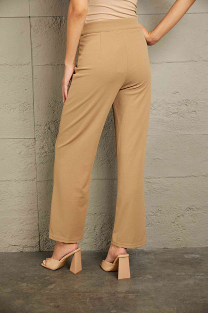 Pantalon droit à couture centrale double prise