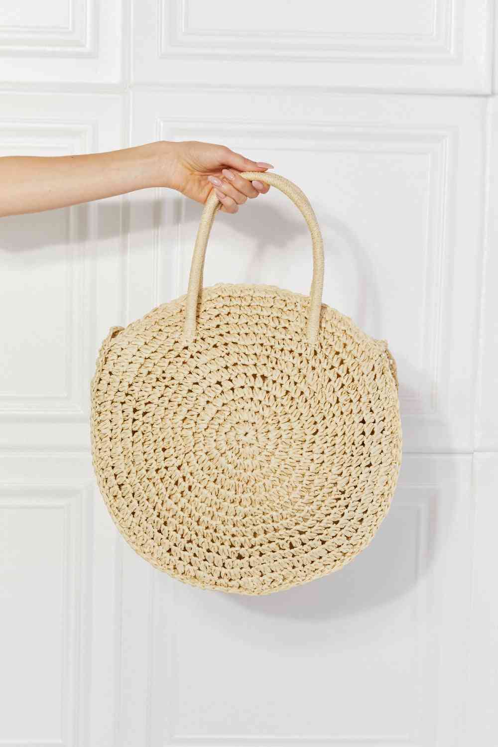 Bolso de mano de mimbre y paja Beach Date de Justin Taylor en color marfil