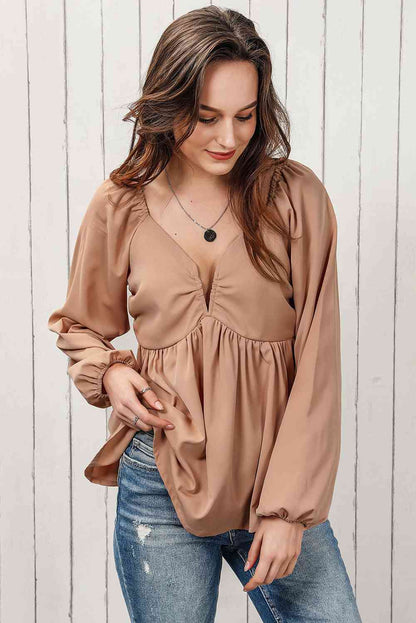 Blusa babydoll de manga larga fruncida con lazo en la espalda de doble toma