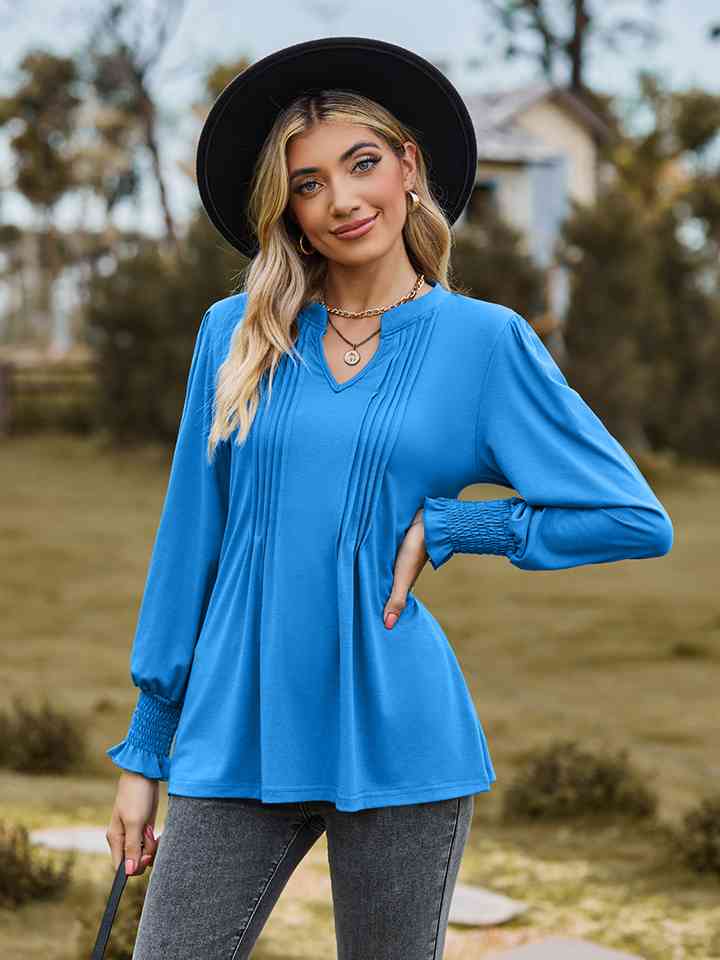 Blouse à manches volantées et col cranté