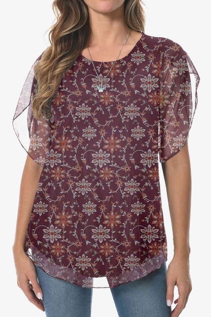 Blusa estampada con cuello redondo y dobladillo redondeado