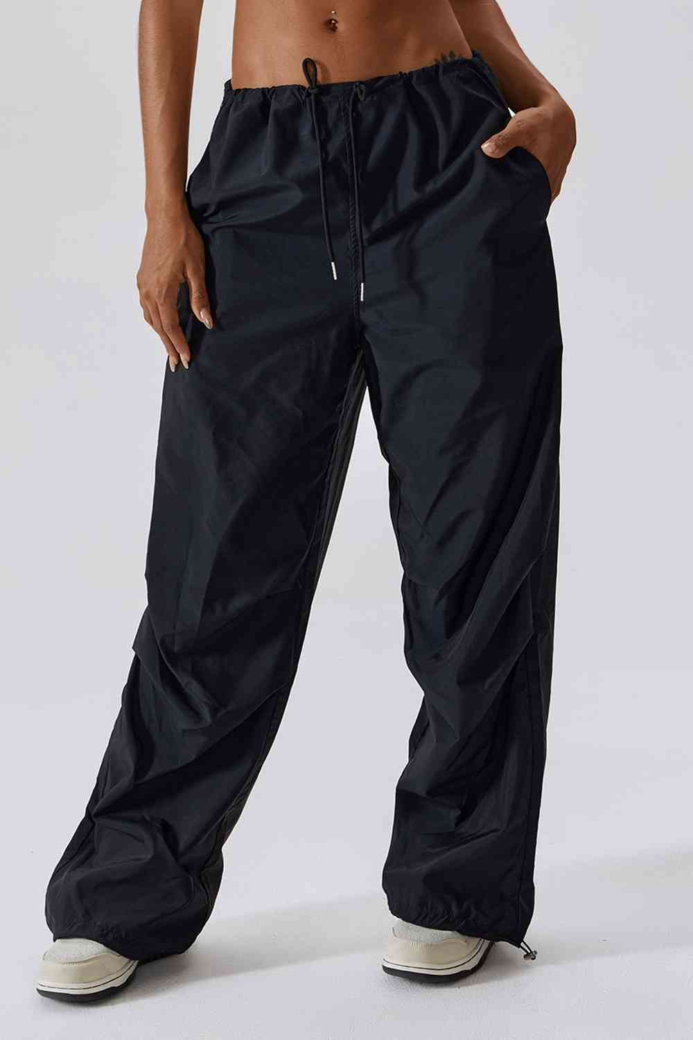 Pantalon de sport long avec poches, coupe ample