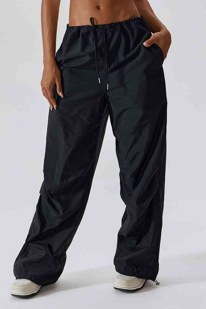 Pantalon de sport long avec poches, coupe ample