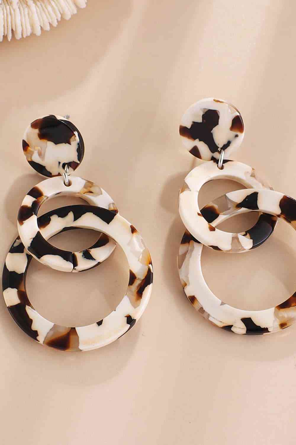 Boucles d'oreilles doubles créoles en acrylique