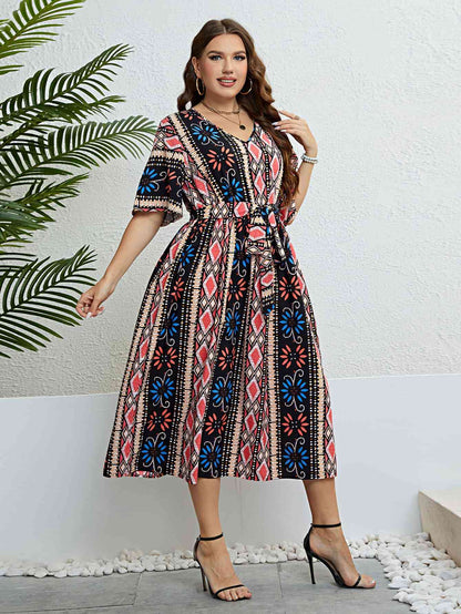 Robe Mi-Longue Bohème à Col en V et Ceinture à Nouer de Grande Taille