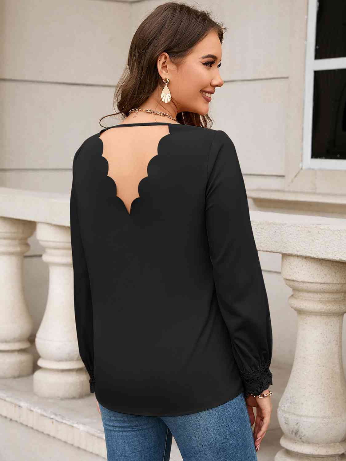 Blusa de manga larga con cuello en V