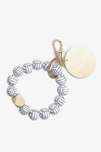 Paquete de 4 llaveros con cuentas en forma de pulsera, surtido