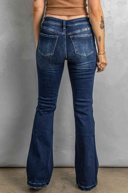 Jean bootcut effet vieilli avec braguette boutonnée