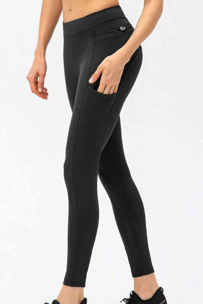 Pantalon de sport long taille haute coupe slim avec poches