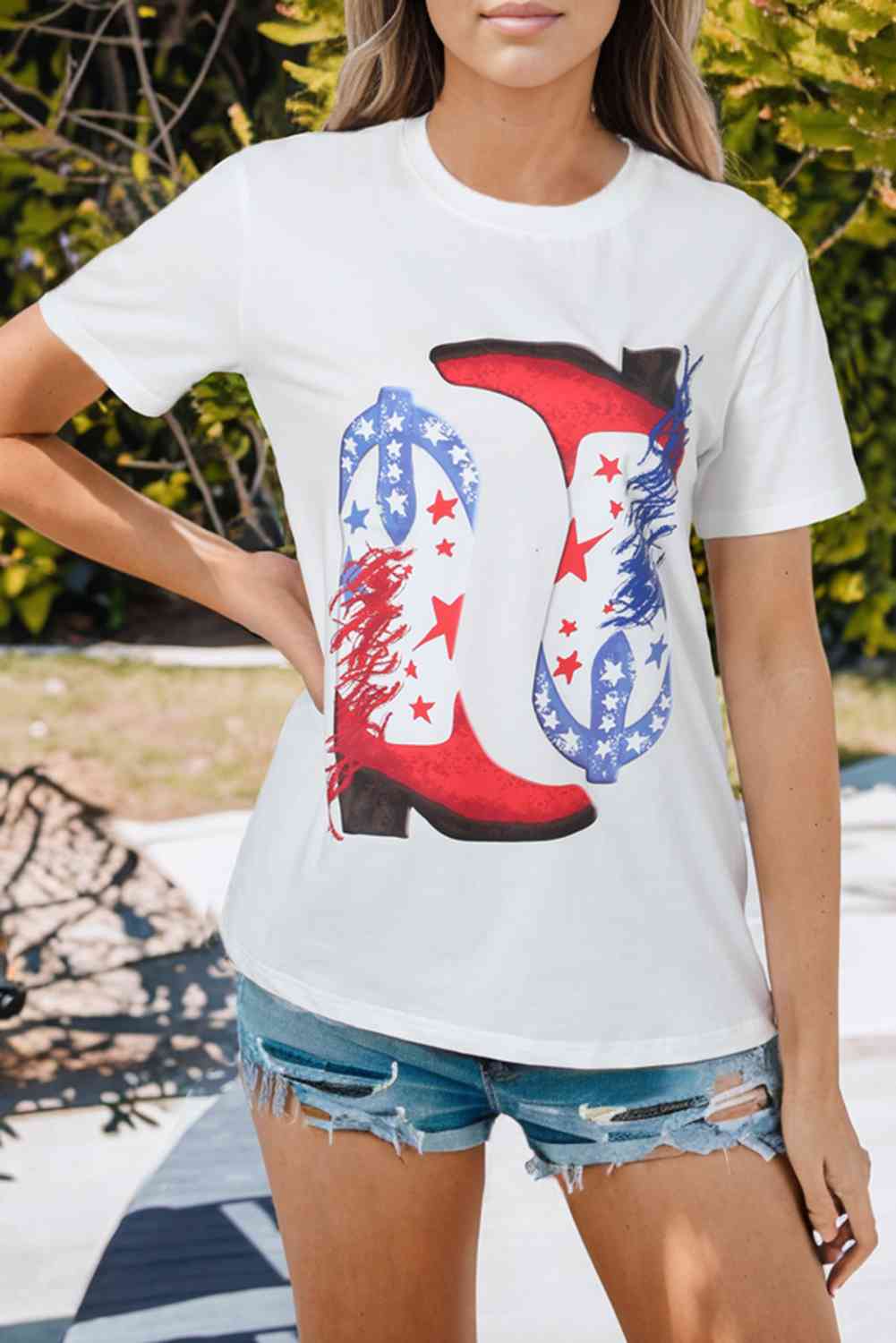 T-shirt graphique avec bottes de cowboy étoiles