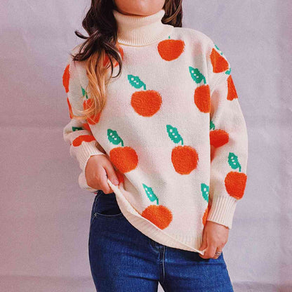 Pull à col roulé et motif de fruits