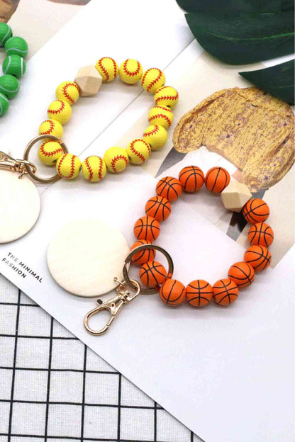 Paquete de 4 llaveros con cuentas en forma de pulsera, surtido