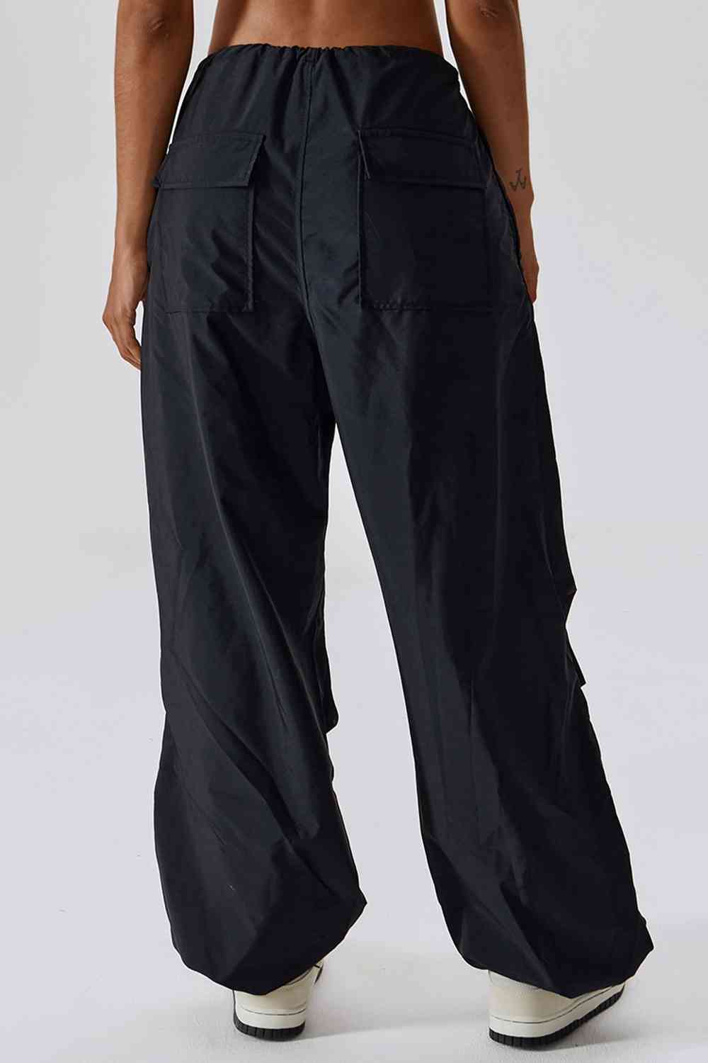 Pantalon de sport long avec poches, coupe ample