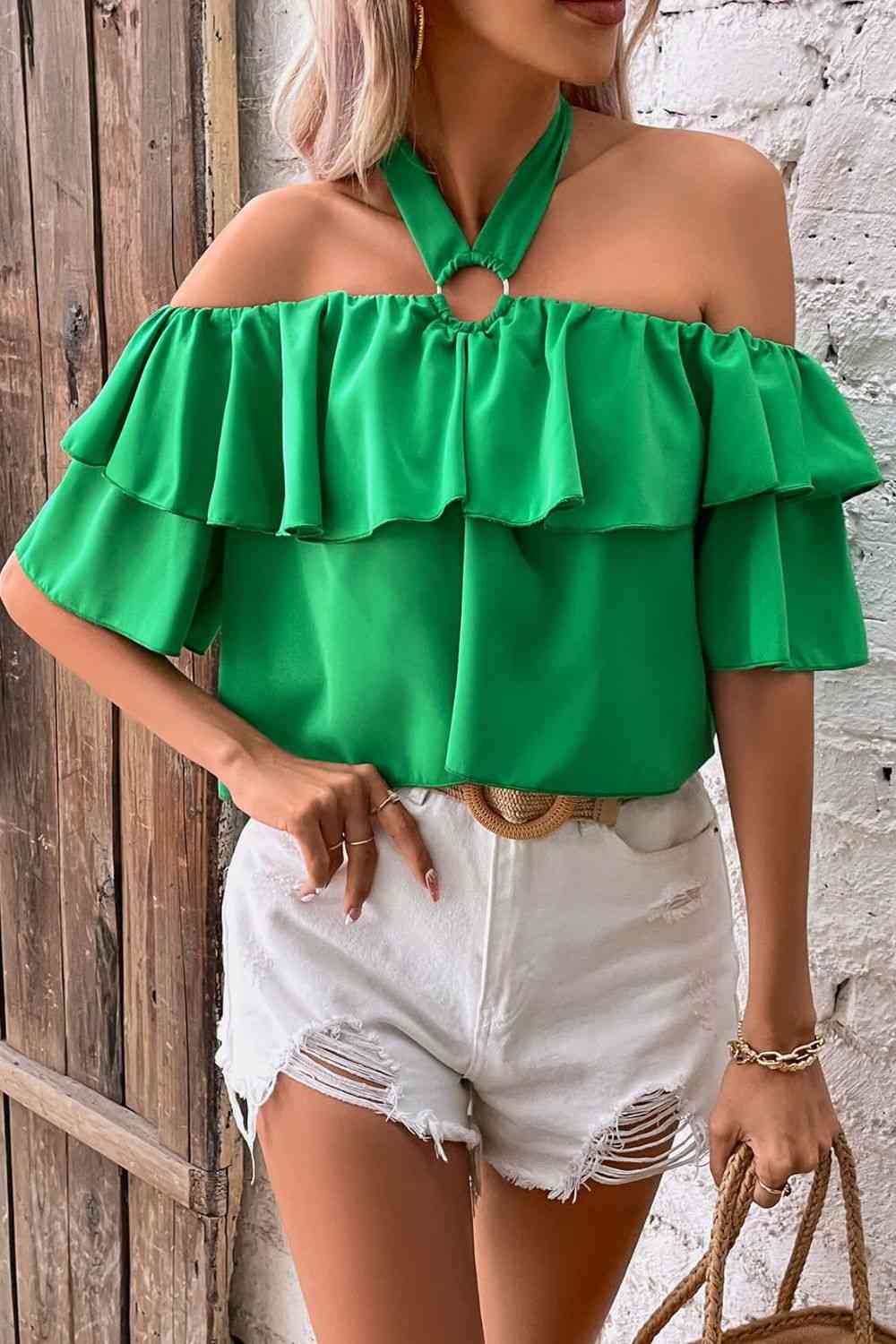 Blusa a capas con volantes y cuello halter