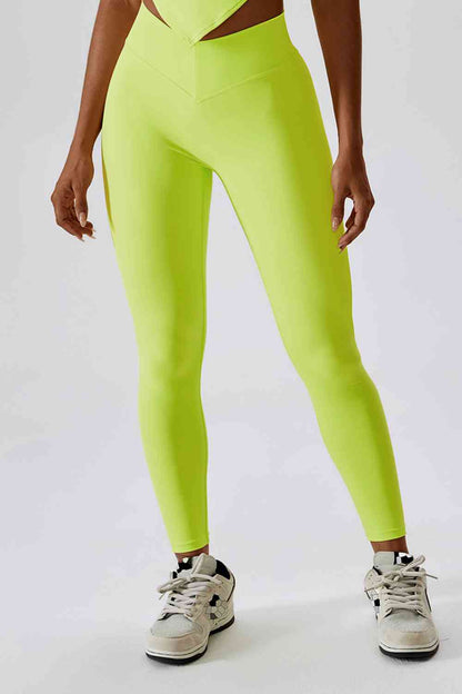 Legging de sport coupe slim avec large ceinture et poche arrière