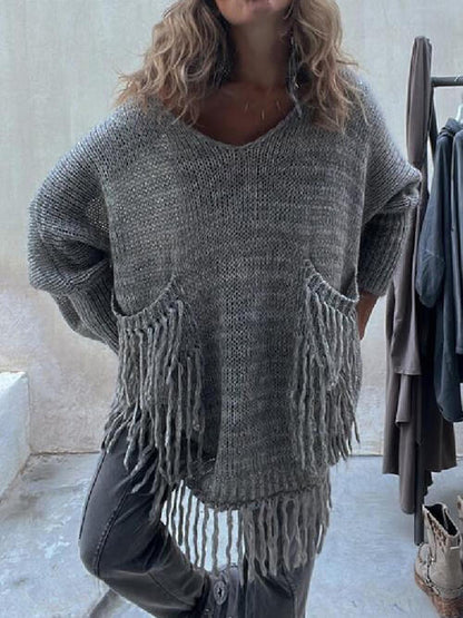 Pull à manches longues avec poches et détails de franges