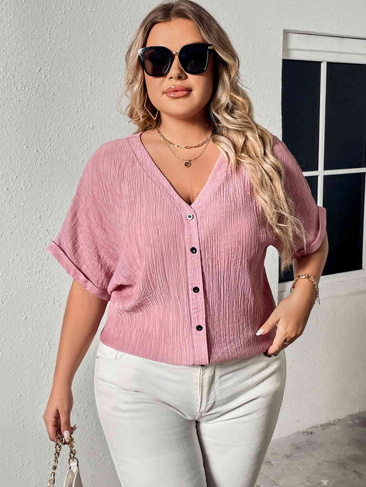 Blusa de manga corta con cuello en V y botones de talla grande