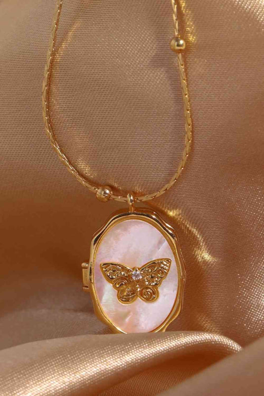 Collier en cuivre pendentif coquille de papillon