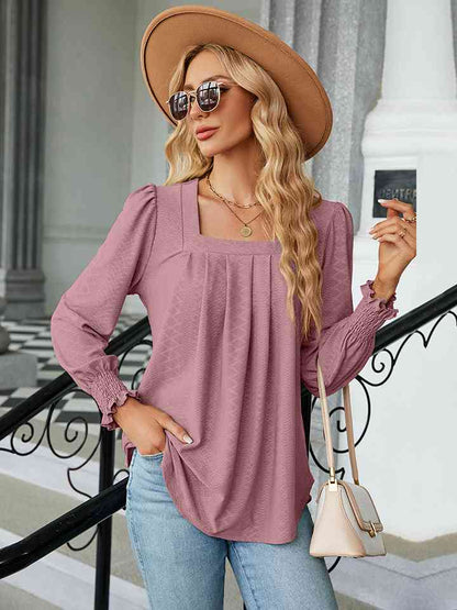 Blusa con cuello cuadrado y manga abullonada