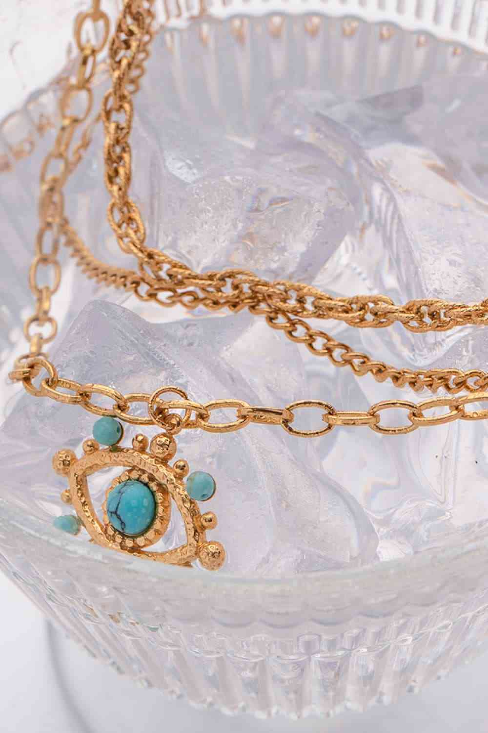 Collier pendentif turquoise motif mauvais œil