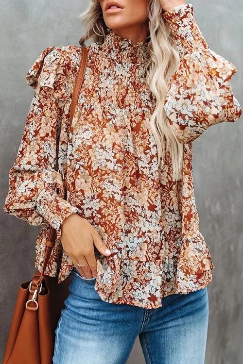 Blusa con volantes y mangas farol fruncidas con estampado floral