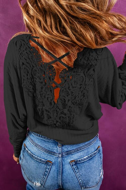 Blusa de manga larga con cuello redondo de canalé