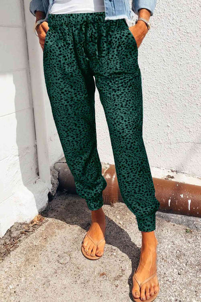 Pantalones largos con bolsillos de leopardo