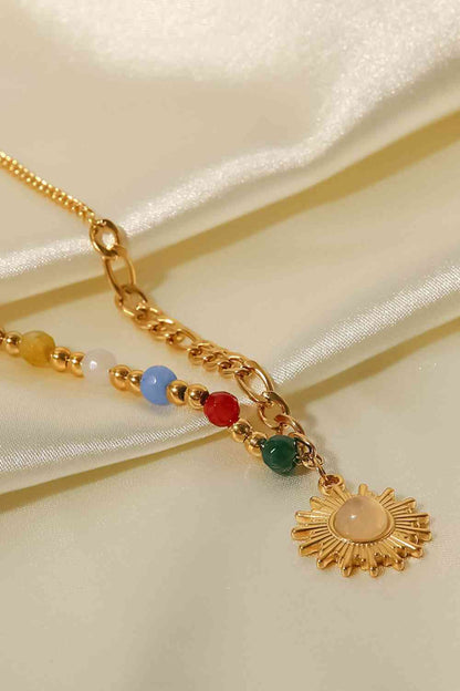 Collier pendentif en forme de soleil en opale