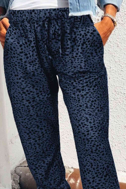 Pantalones largos con bolsillos de leopardo