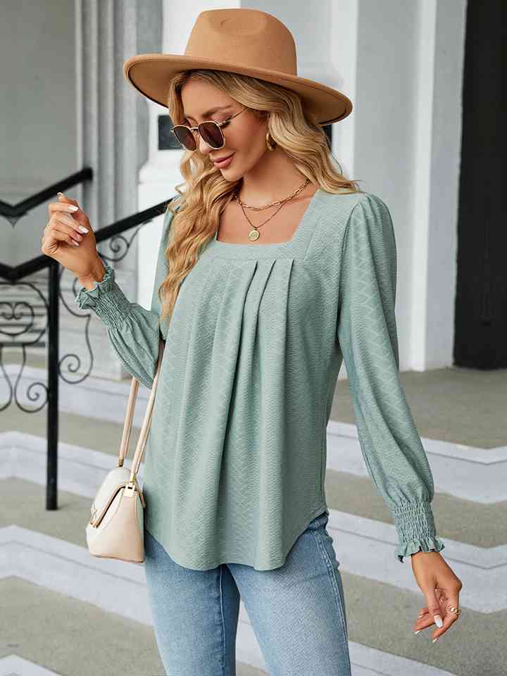 Blusa con cuello cuadrado y manga abullonada