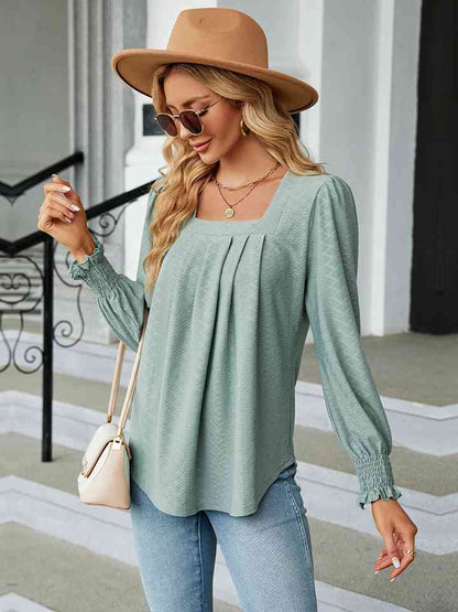 Blusa con cuello cuadrado y manga abullonada