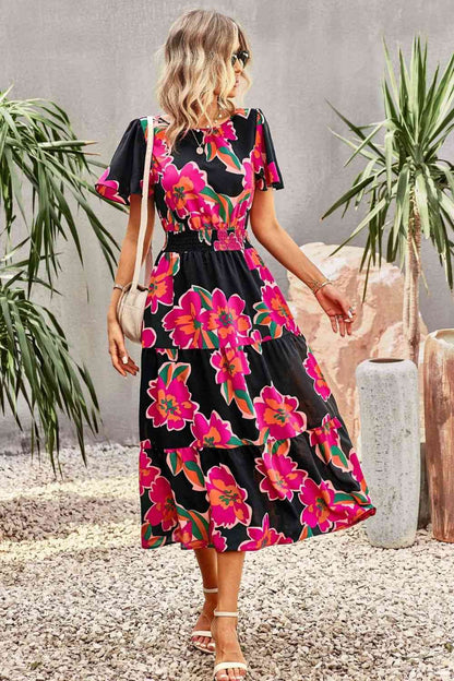 Vestido midi escalonado con mangas abullonadas y estampado floral