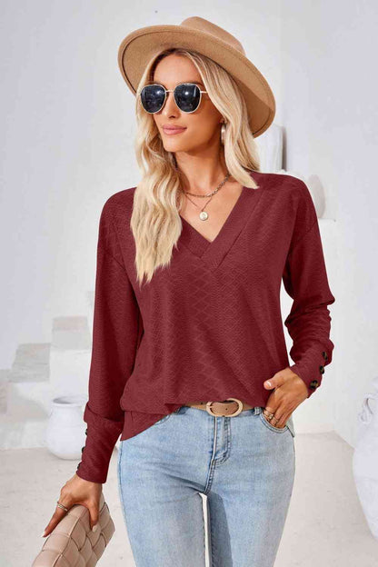 Blusa de manga larga con cuello en V