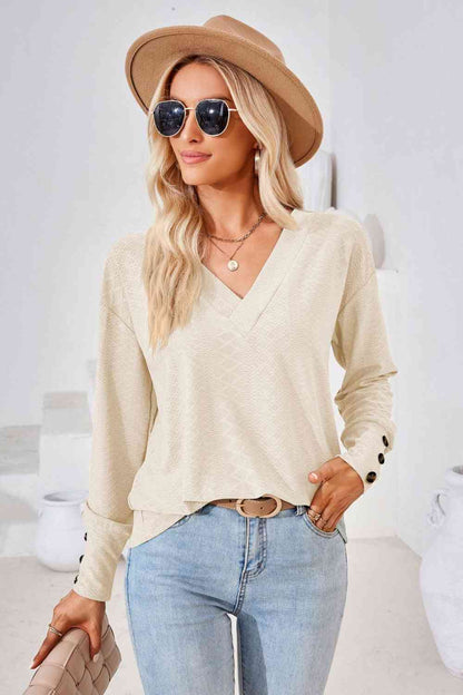 Blusa de manga larga con cuello en V