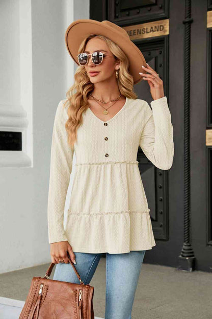 Blouse en tricot torsadé à manches longues et col en V