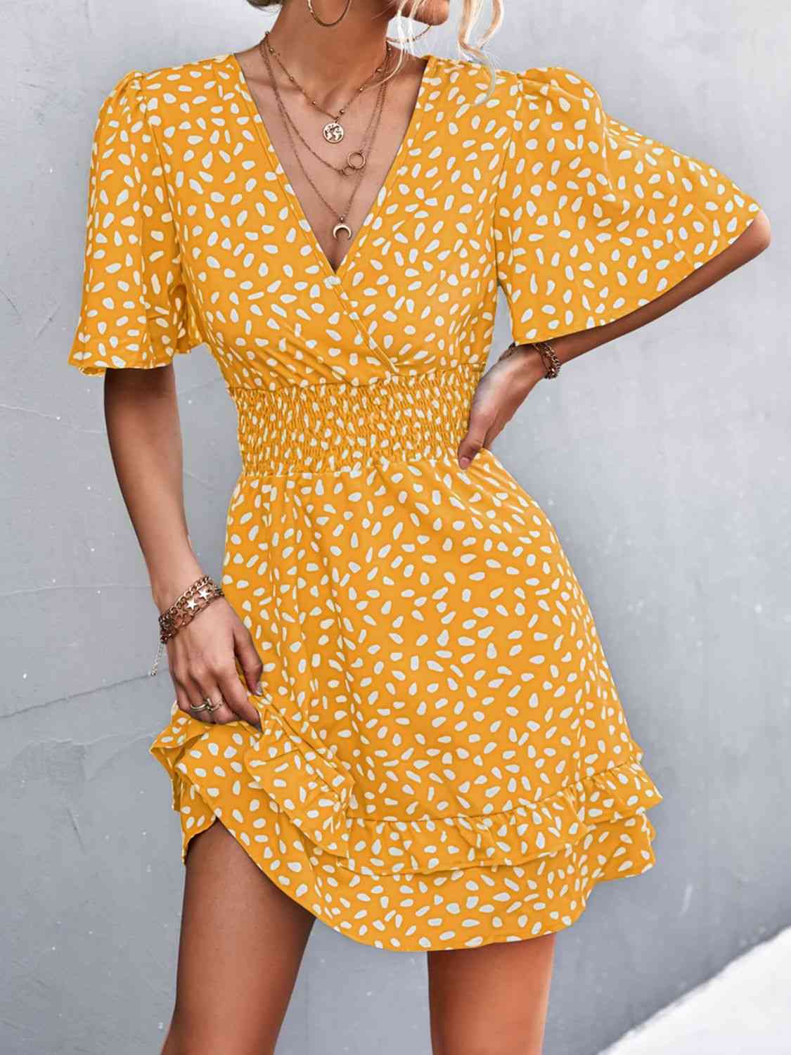 Robe surplis superposée imprimée à taille smockée