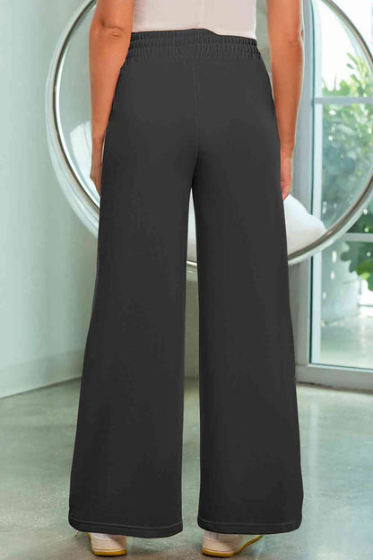 Pantalones anchos con cordón y bolsillos