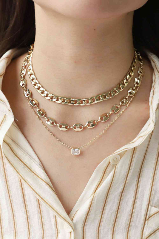 Conjunto de tres piezas de collar de cobre con circonitas