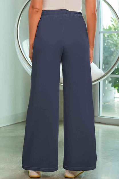 Pantalones anchos con cordón y bolsillos