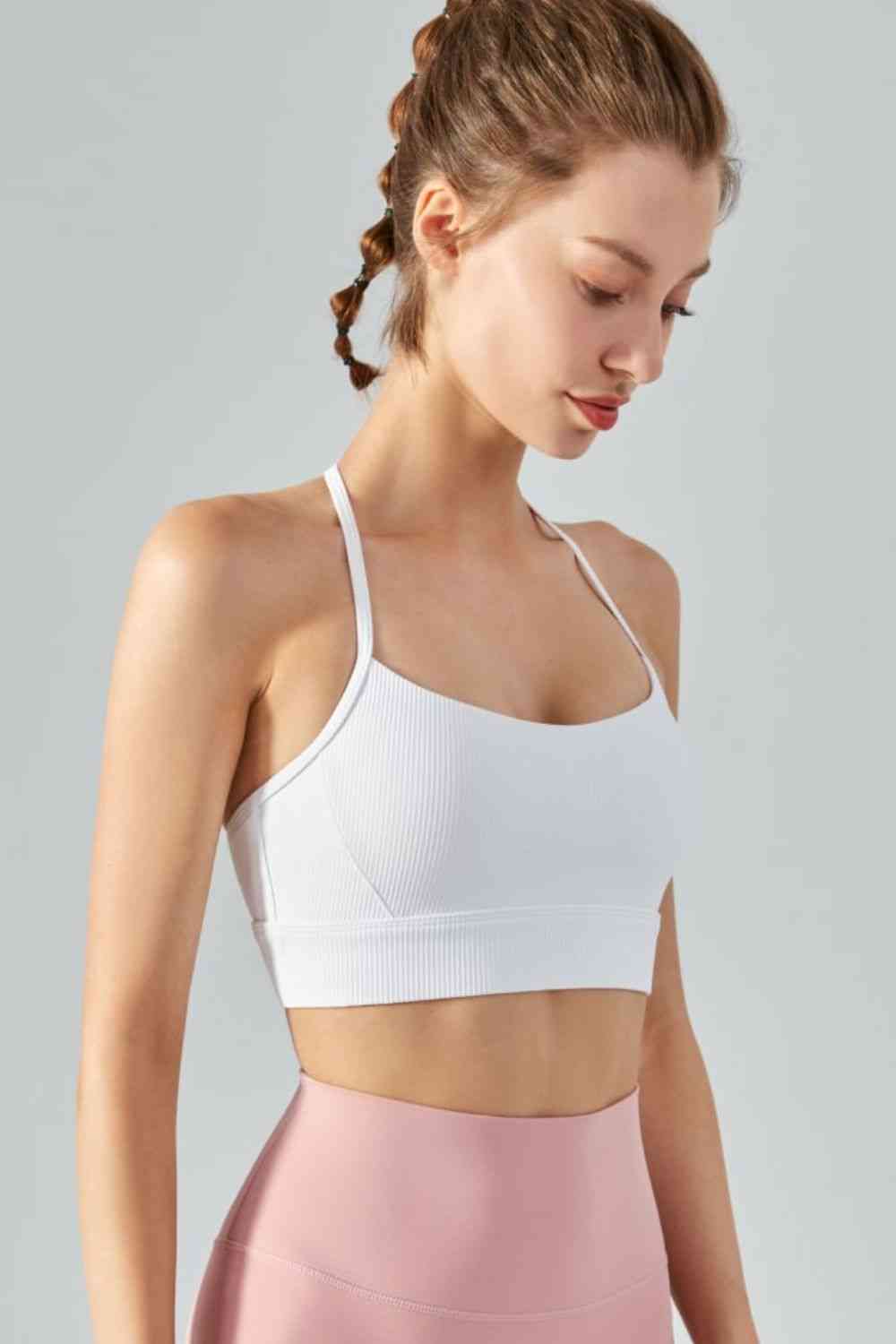 Camisole de sport courte côtelée à col licou et dos ouvert