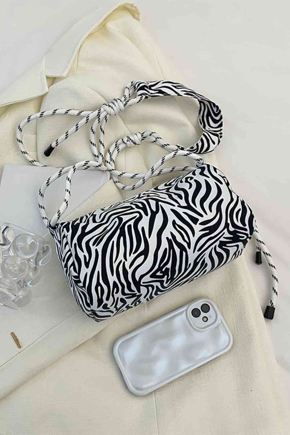 Bolso de mano de nailon con estampado animal