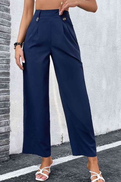 Pantalones anchos con cintura plisada y talle alto