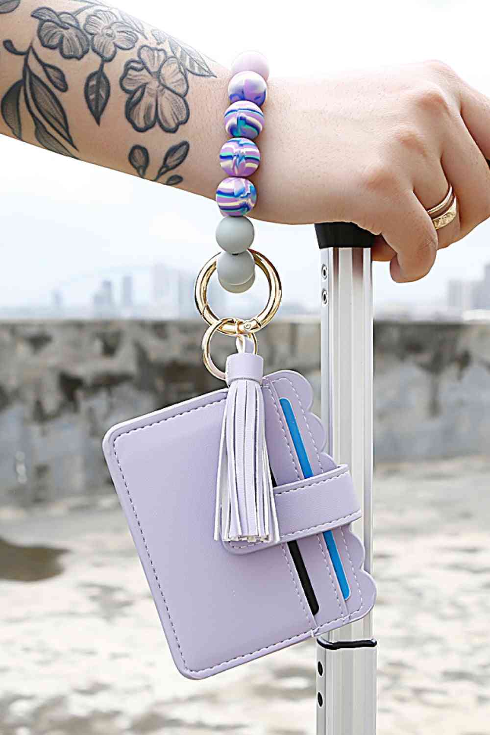 Porte-clés à pampilles perlées avec portefeuille