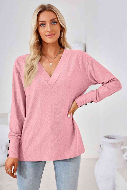 Blusa de manga larga con cuello en V