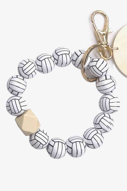 Paquete de 4 llaveros con cuentas en forma de pulsera, surtido