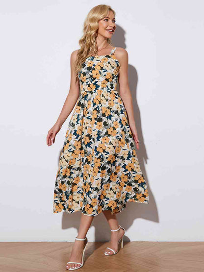 Vestido midi sin mangas con lazo floral