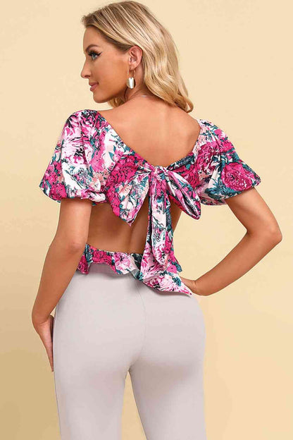 Blouse courte à basque nouée à fleurs